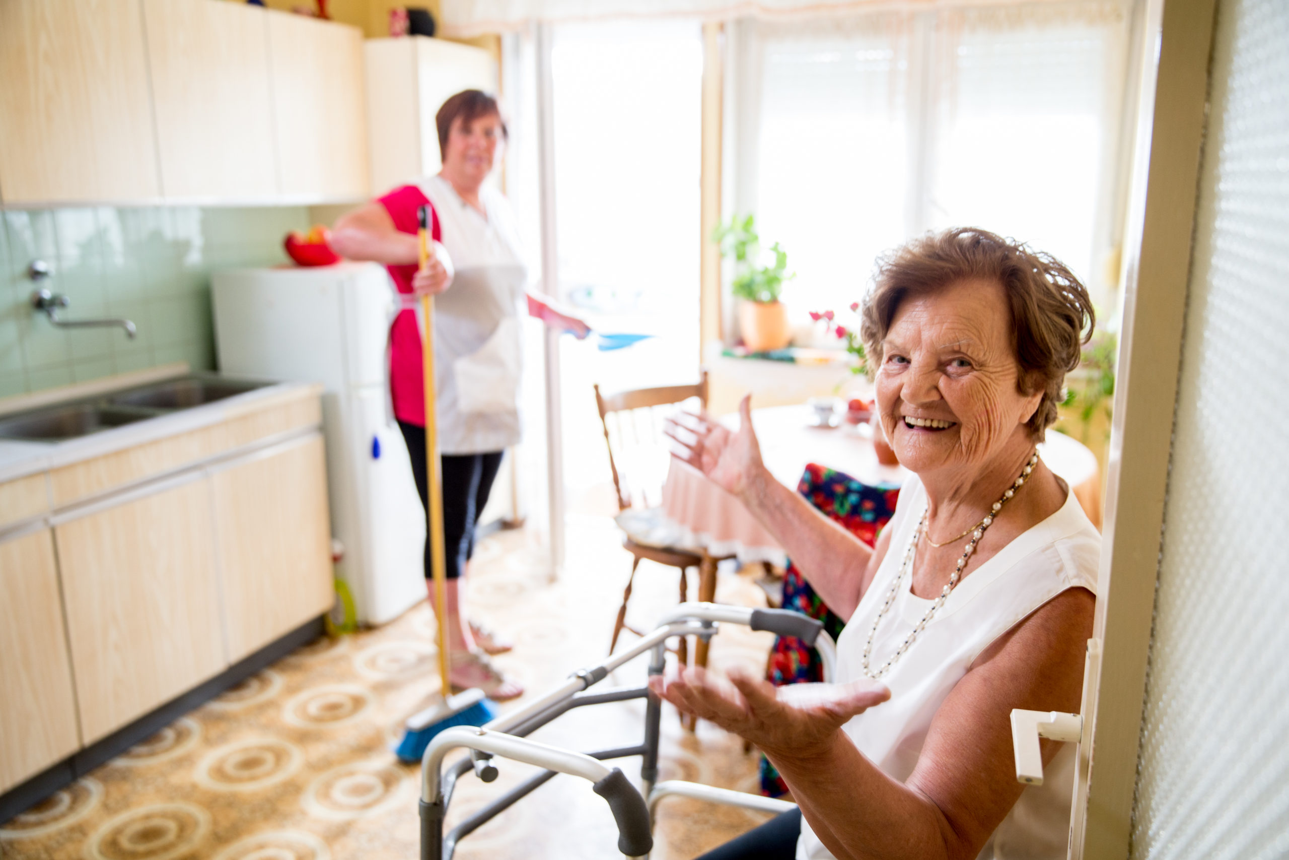 Caregiver Doing the Chores for elderly